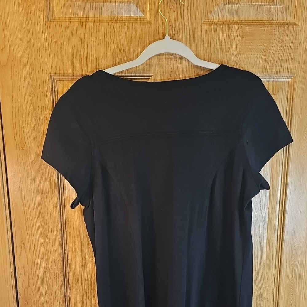 Chic Black Mini Dress with Embellished Neckline - Picture 9 of 10